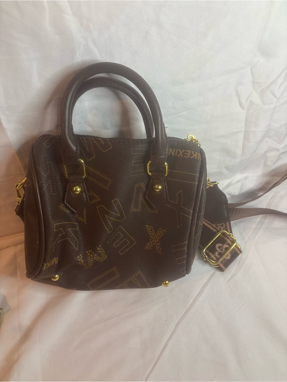 Luxury-Inspired Brown Pattern Satchel with Gold Accents